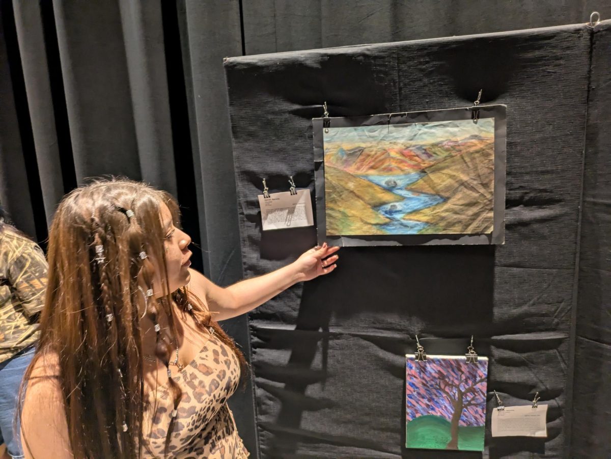 Senior Samiah Balcorta talks about one of her pieces, Paradise.